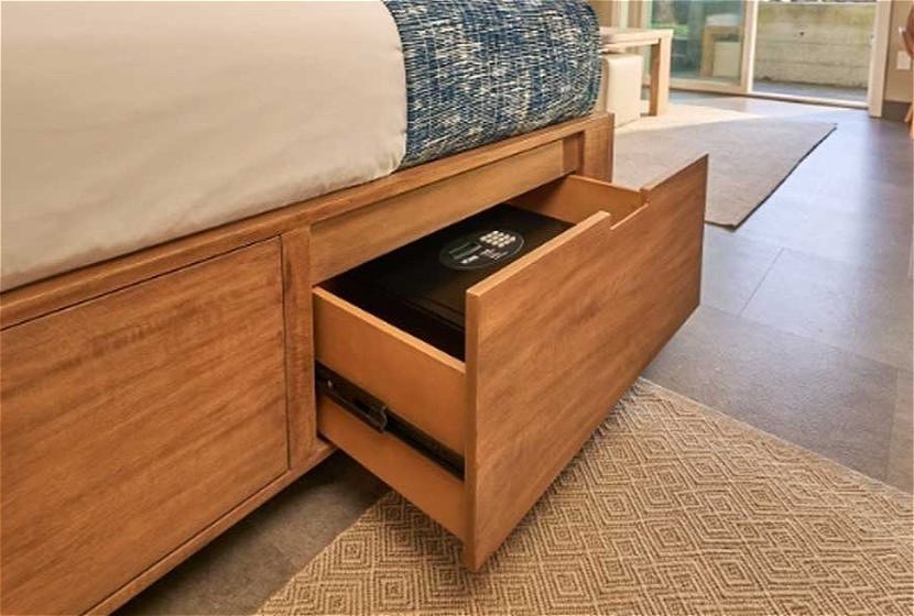 Hotel safe hidden under bed